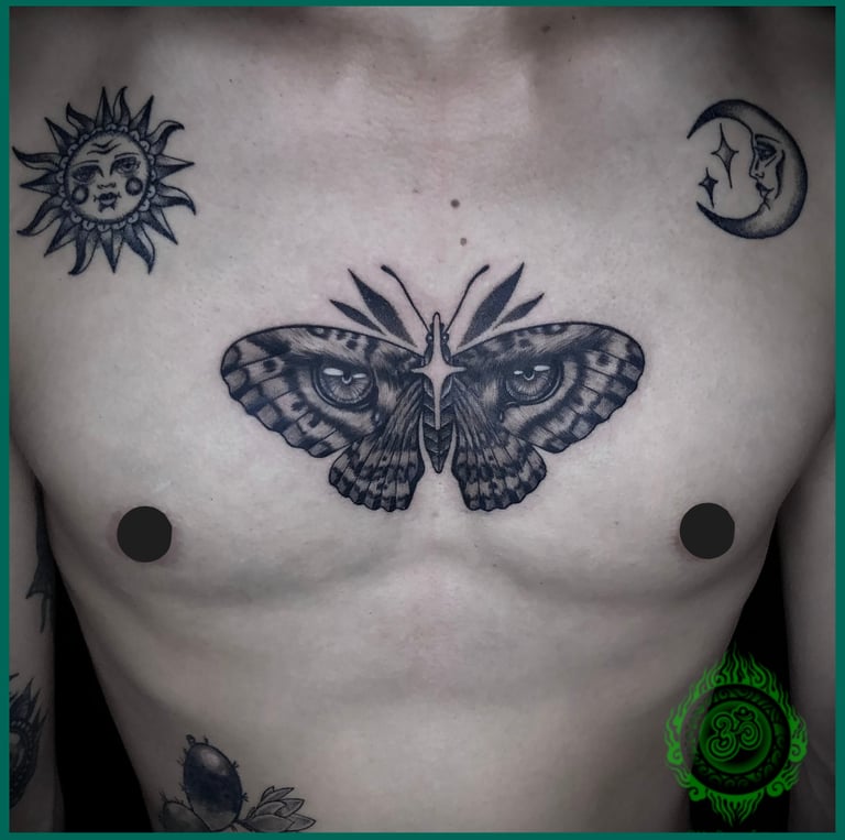 butterfly chest tattoo