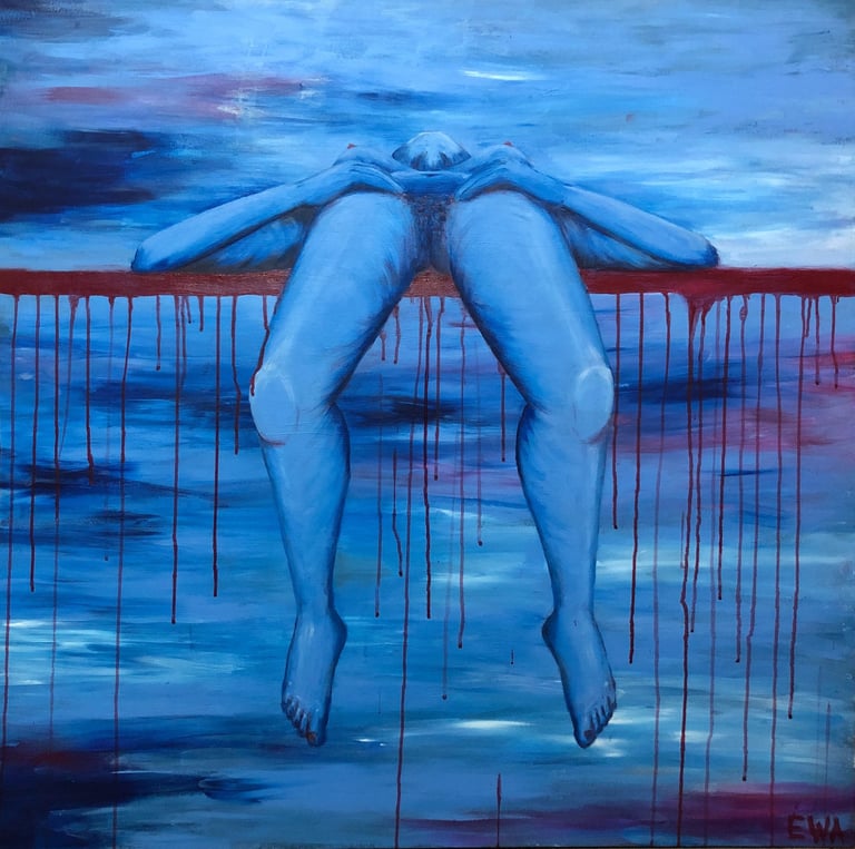 naked woman painting in blue