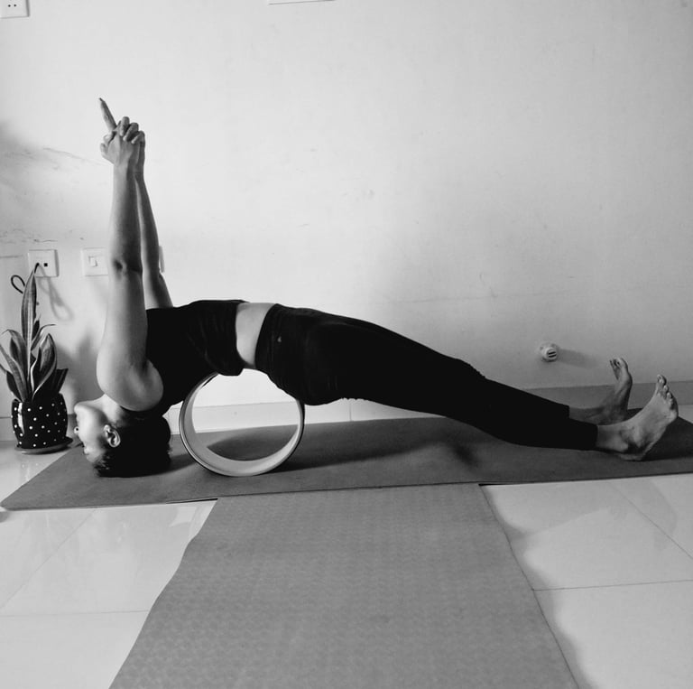 Dr Beauty teaching Yoga online back bending back strengthening with props