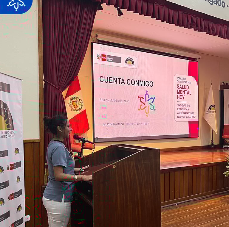 a woman standing at a podium with a presentation