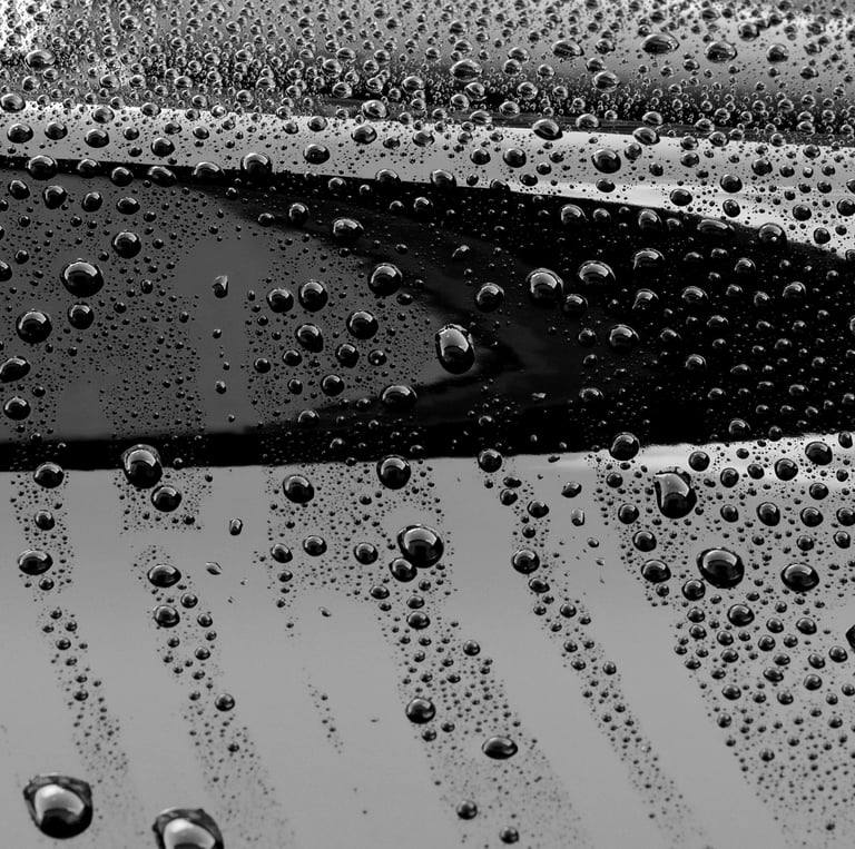 water droplets on a back car surface