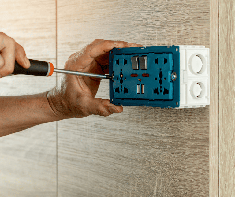 JKO Handyman installing a communications outlet in Lakeland, Winter Haven, and Central Florida.