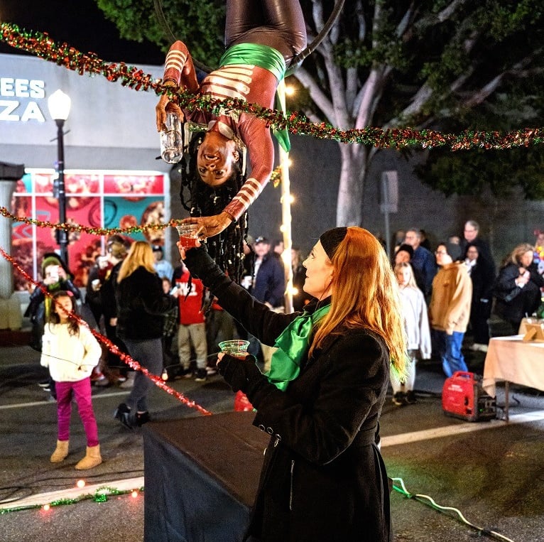 Onyx Black pouring specialty elixirs for Aerialogists & Amber Nelson assists - Photo by Jim Sabo