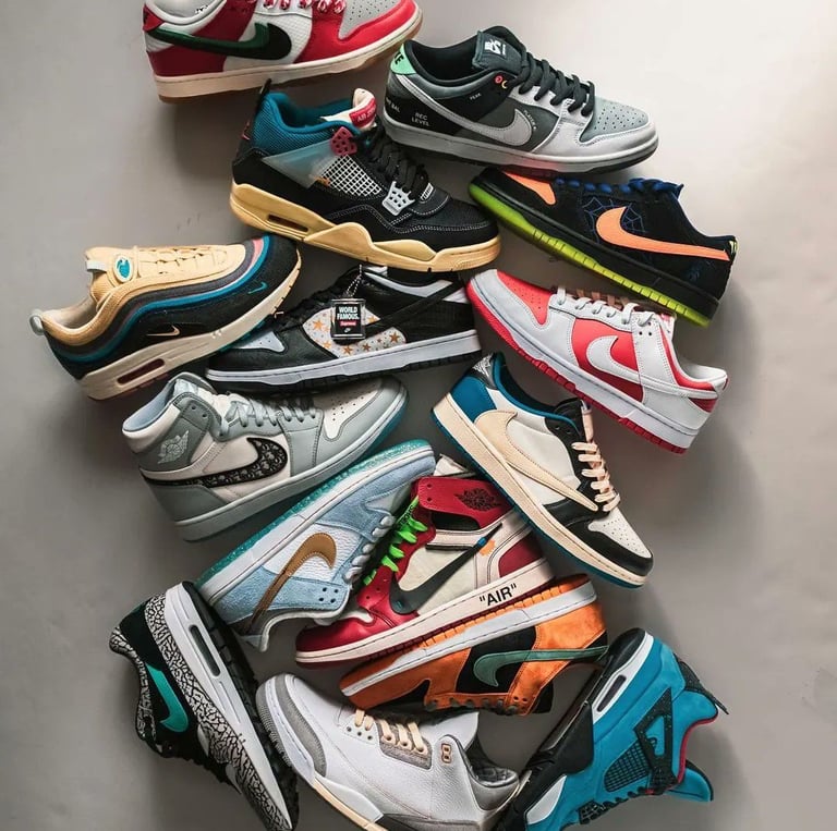 a bunch of different colored sneakers are shown