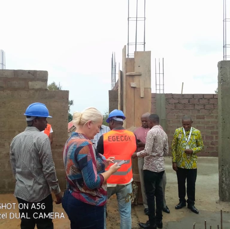 a group of people standing around a building