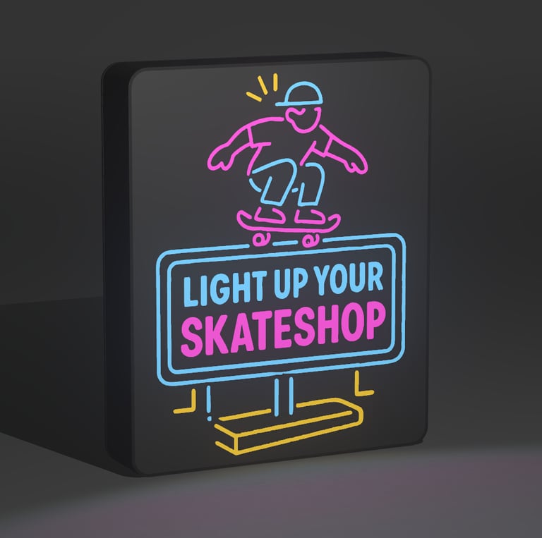 Close-up of a 3D-printed lightbox featuring a bold skate graphic and warm LED lighting.