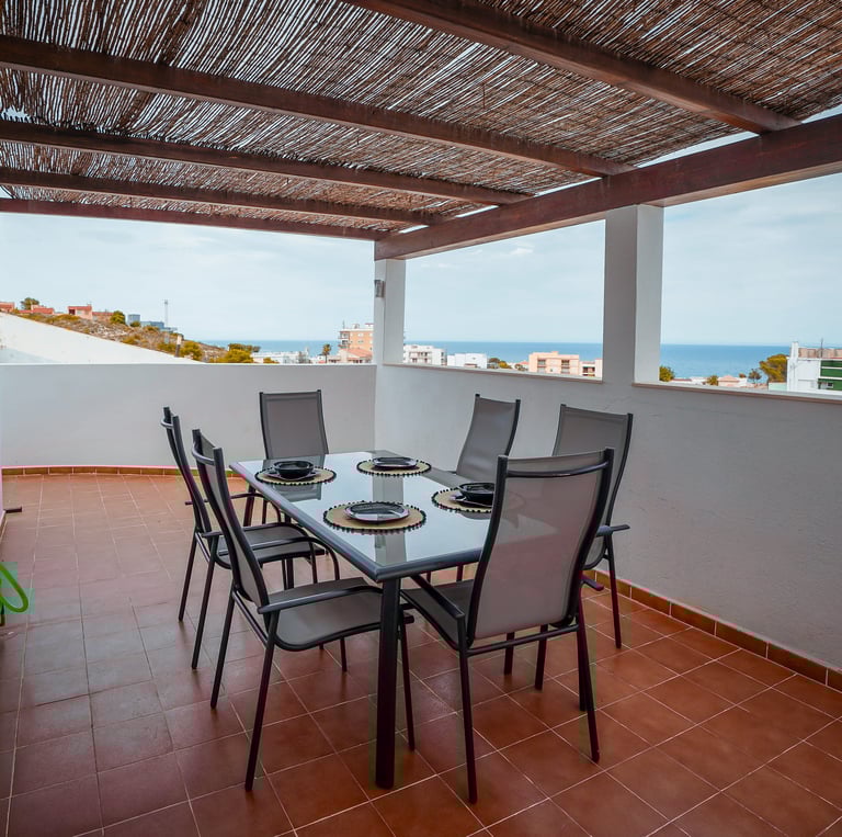 a table with plates and plates on it Cullera