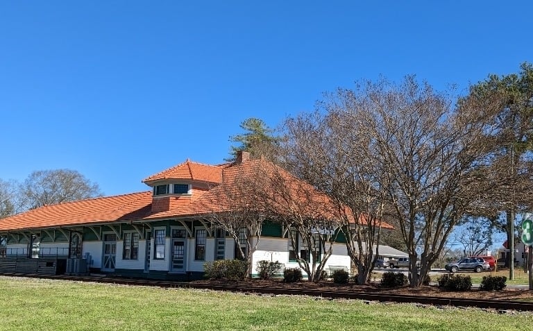 Beautiful photo of The Train Depot in lovely Downtown Lavonia. The trees are blooming.
