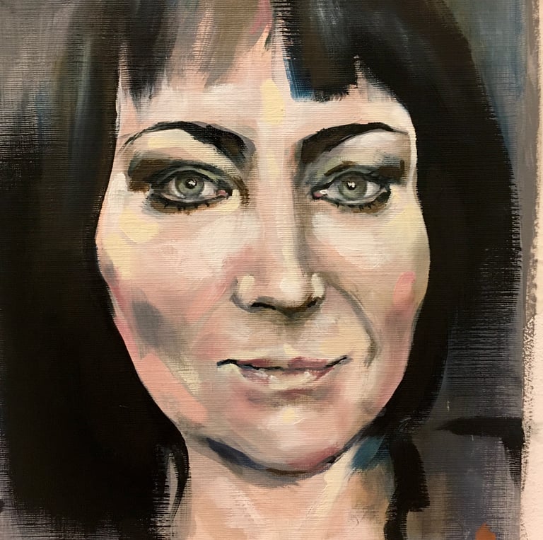 Oil painting portrait of a woman with black-blue hair and green eyes.