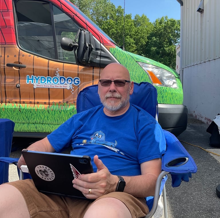 Jody relaxing in a quiet moment during a charity dog wash.