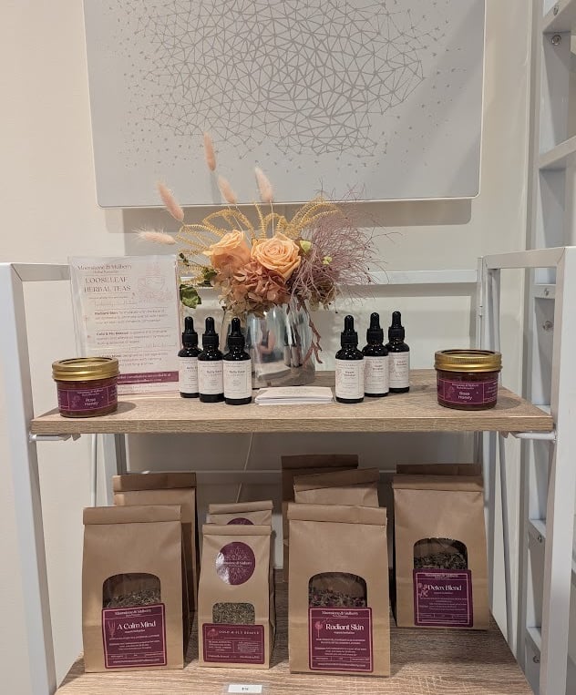 a display of an assortment of products from Moonstone & Mulberry Herbal Remedies