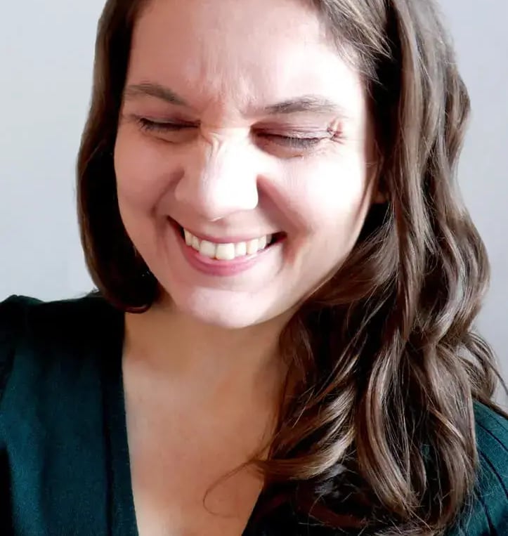 a woman with a smile on her face