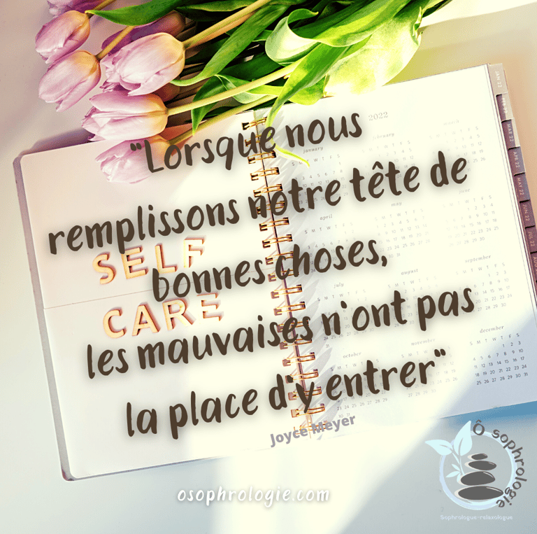 a notepad with a notepad and flowers