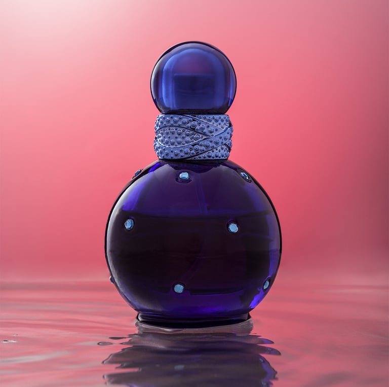 Bottle of perfume on water