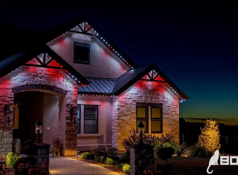 house with bright permanent lighting on the trim