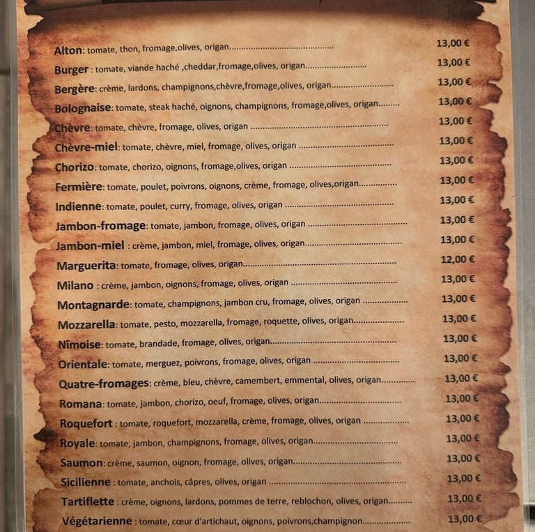 French pizza menu list with prices for varieties like Marguerita, Quatre-fromages, and Royale.