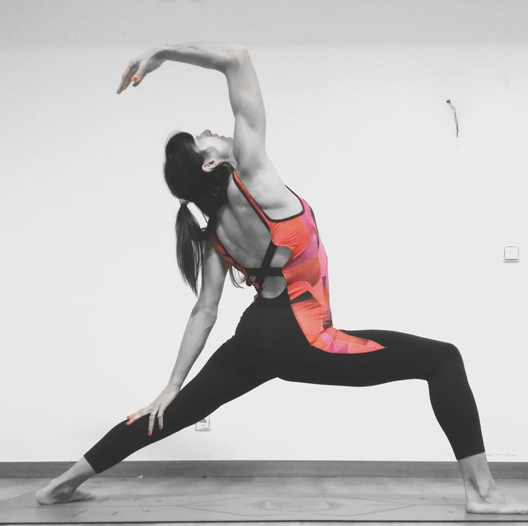 a woman in a sports bra top doing yoga