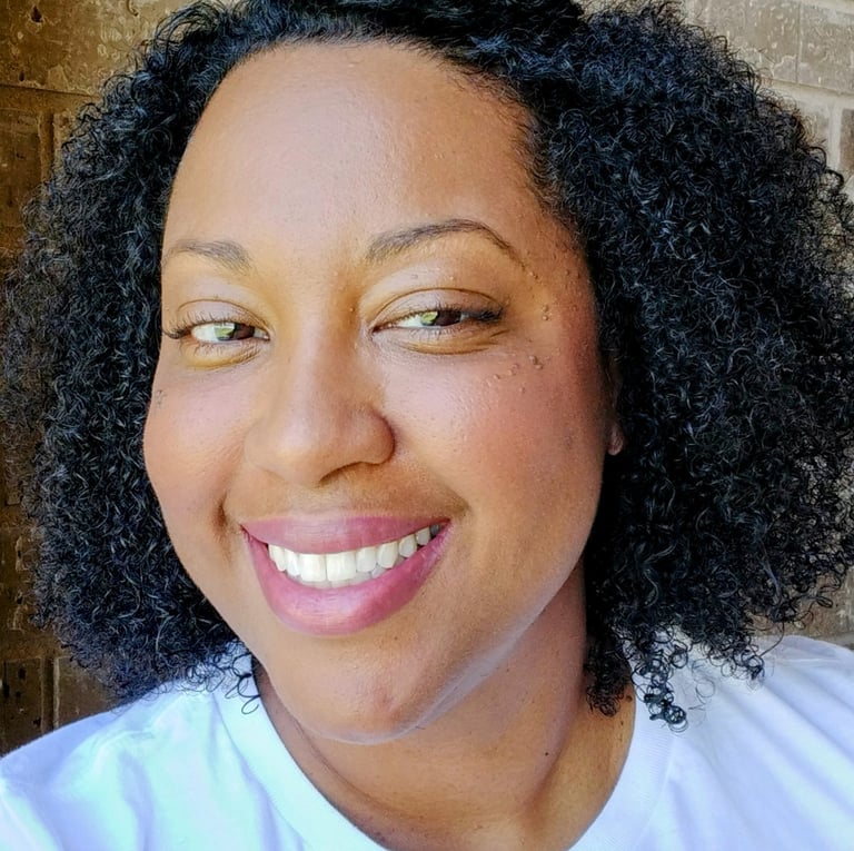 a woman with a white shirt and black hair