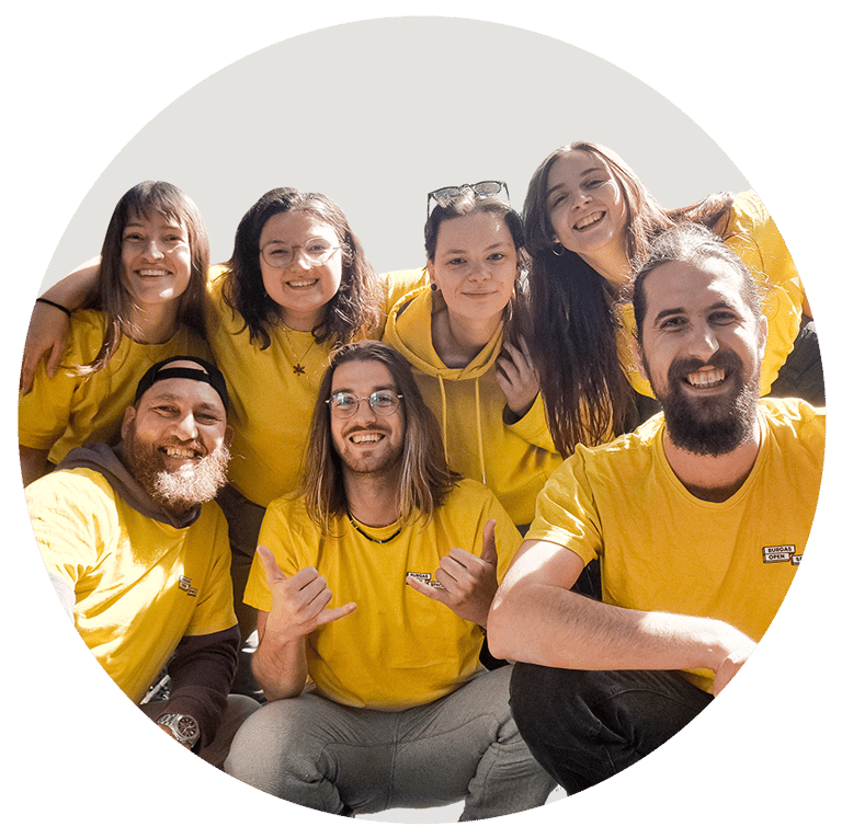 a group of people in yellow shirts