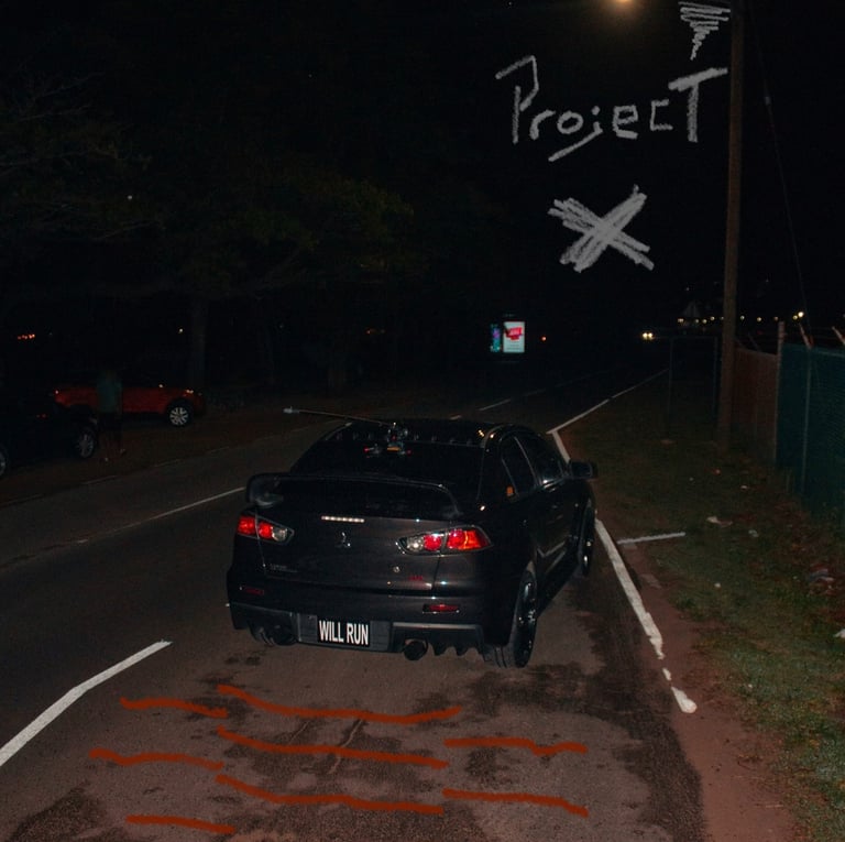 black evo 10 lining up for a drag race