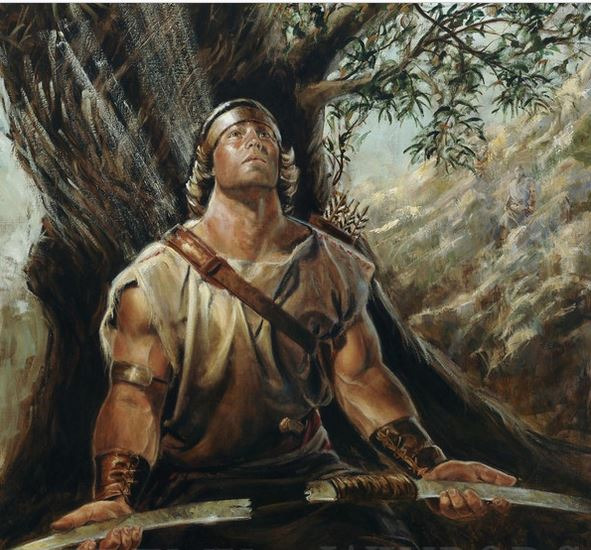 a picture of a man sitting beneath a tree