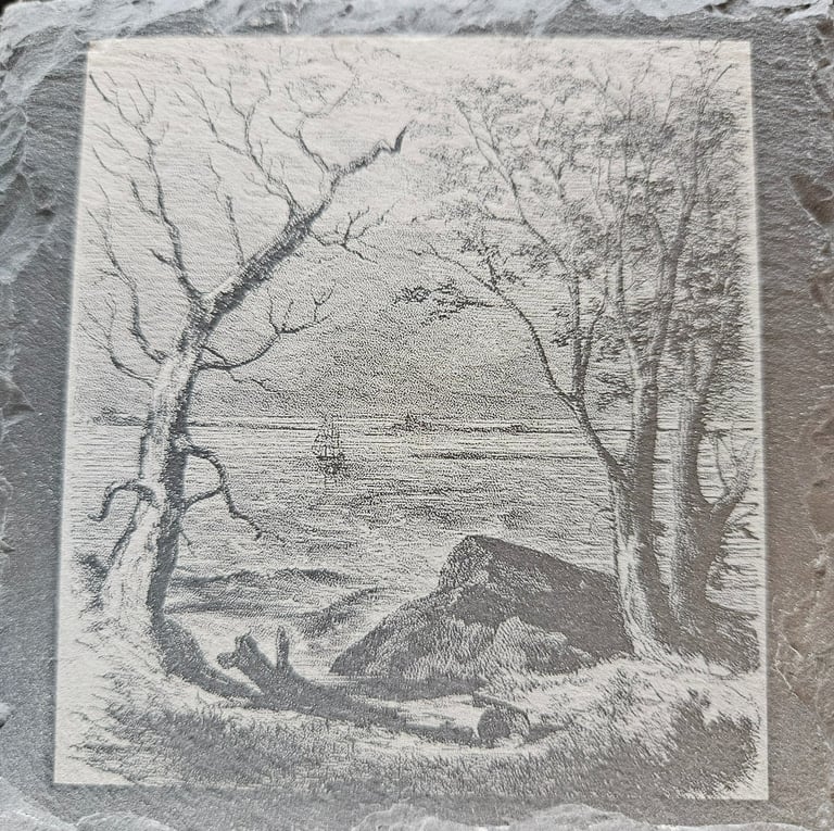 a picture engraved on ceramic coaster