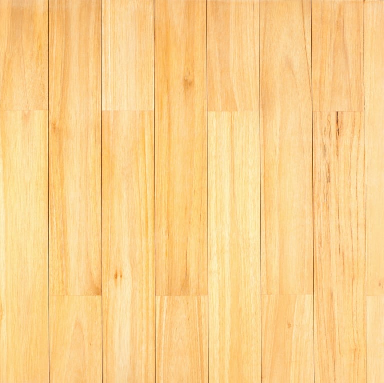 sample of a vinyl floor with light brown wood decor