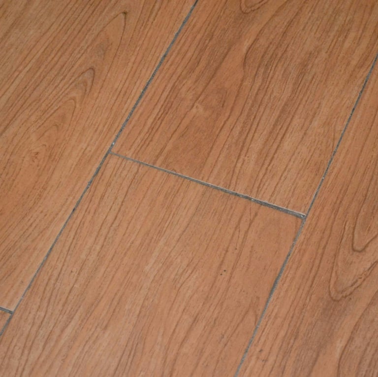 sample of laminate floor with brown wood decor
