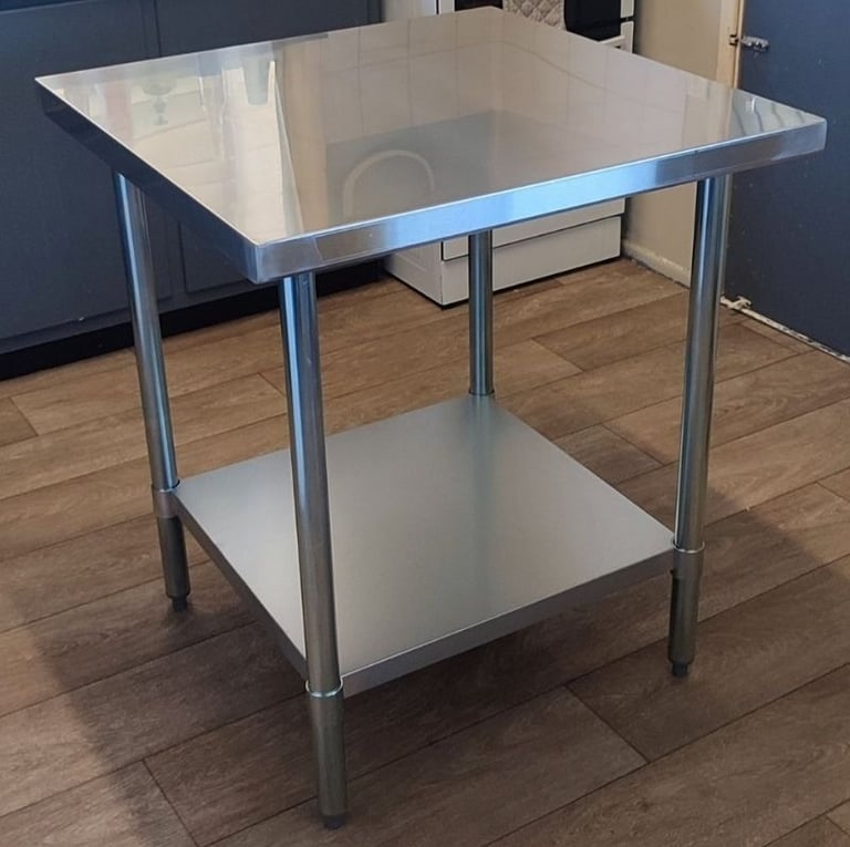 Table Hire: Compact square stainless steel workbench with undershelf, ideal for small spaces.