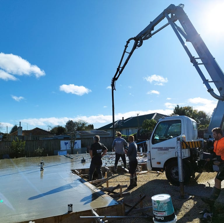 Whakatane building of a crane is being used to build an architectural concrete slab