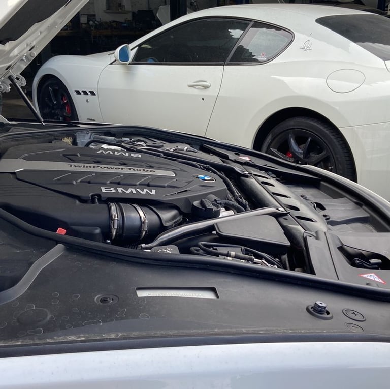 a car with a engine in the engine bay
