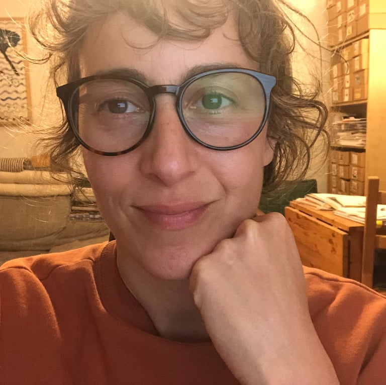 me wearing my glasses and looking into the camera