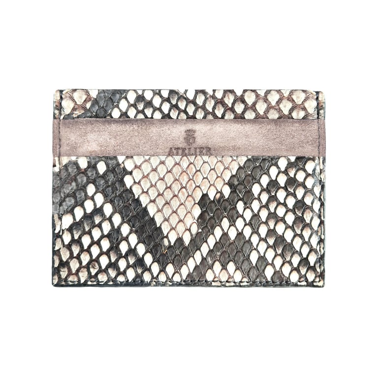 Luxury snakeskin leather card holder with grey suede trim and Atelier logo.