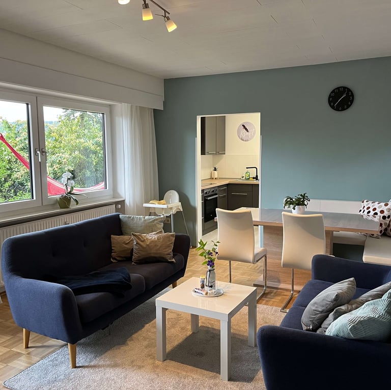 a living room with a couch and a table