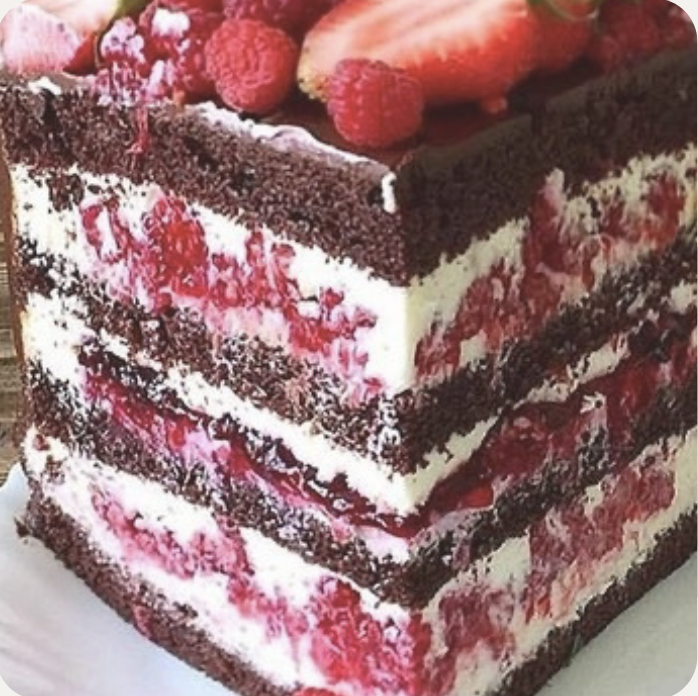 a piece of cake with strawberries on top of it