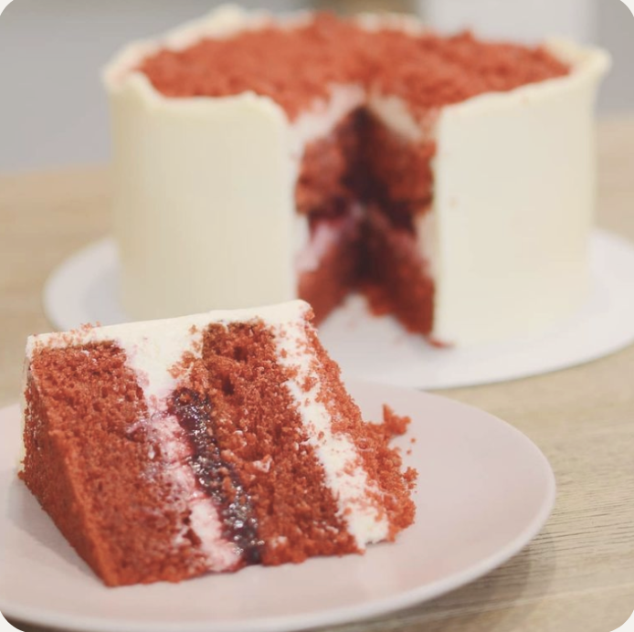 a slice of cake with a slice taken out of it