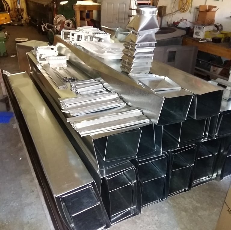 a bunch of metal ducts designed and crafted by bystrom industries