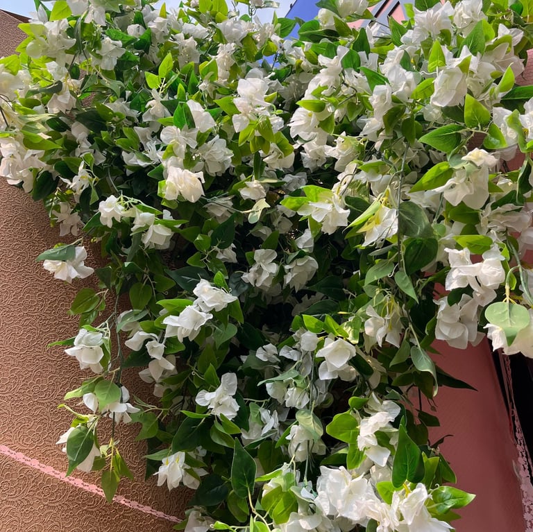 The artificial bougainvillea creeper adds a vibrant touch to any space. Its lifelike appearance make