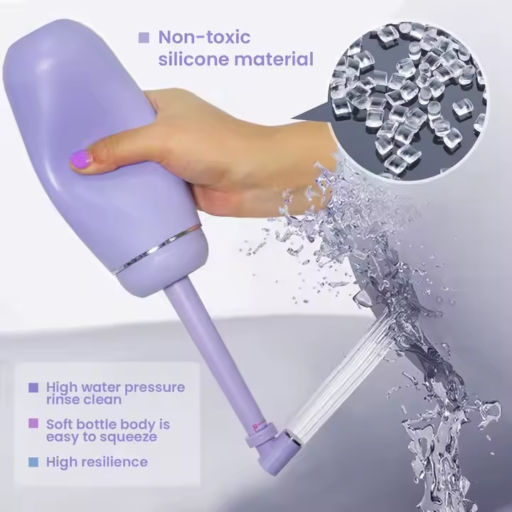 a hand holding and squeezing a portable water with water coming out of the nozzle