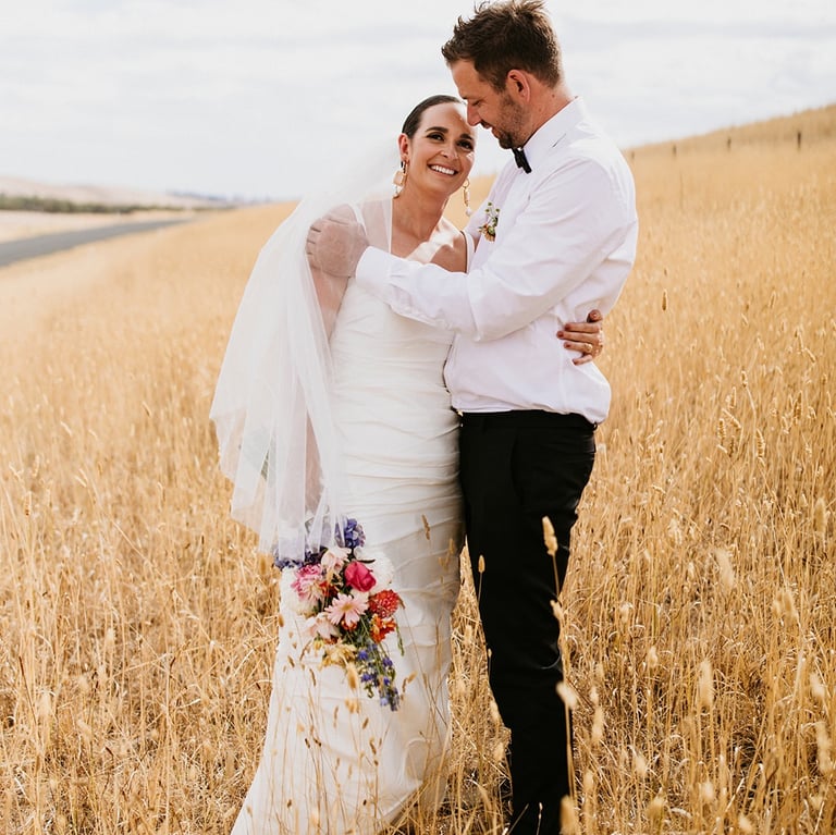 Happy couple walking down the aisle after saying I do on the Sunshine Coast and Noosa Wedding
