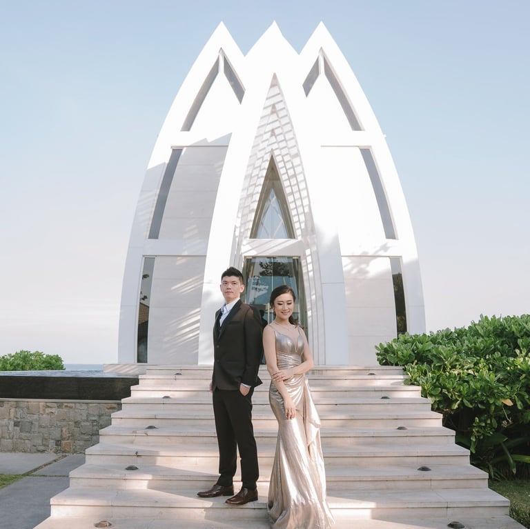 Prewedding couple on chapel stairway at The Ritz-Carlton Nusa Dua Bali.