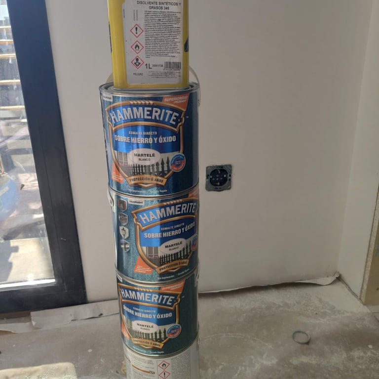 a stack of cans of various types of cans