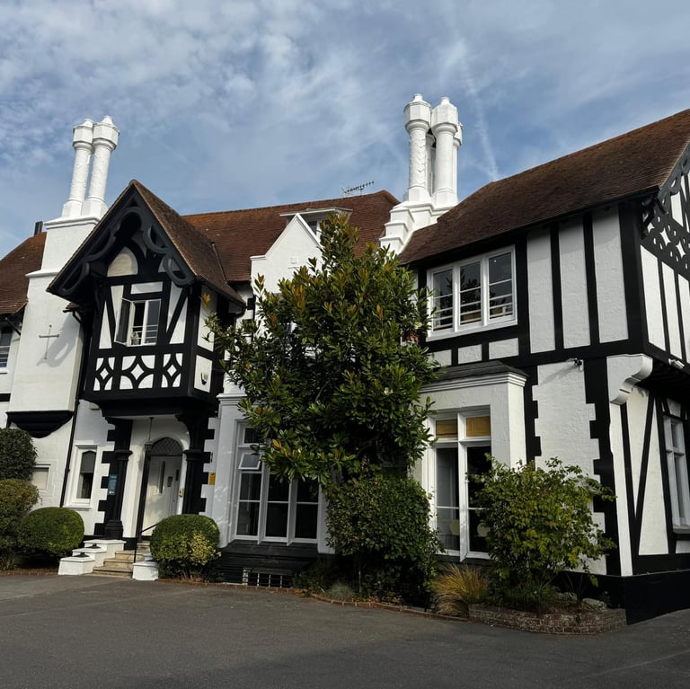 Exterior woodwork and property restoration on a traditional Sussex home