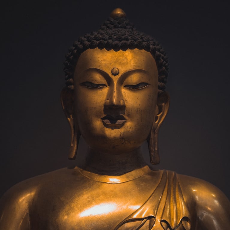 a brass buddha statue 