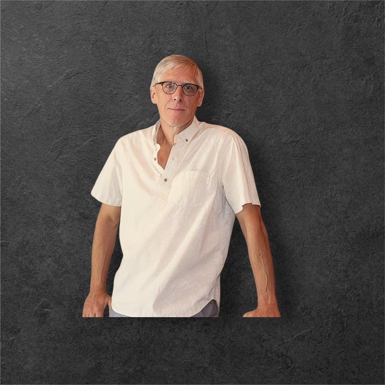 a man in a white shirt and glasses