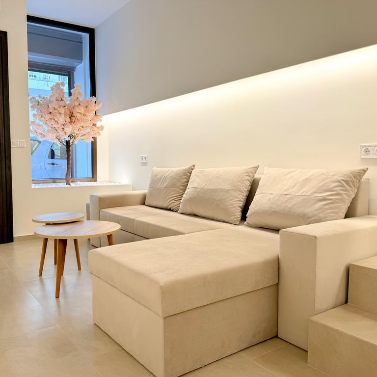 Ground floor - Living room with Sofa bed and 58' 4K TV.