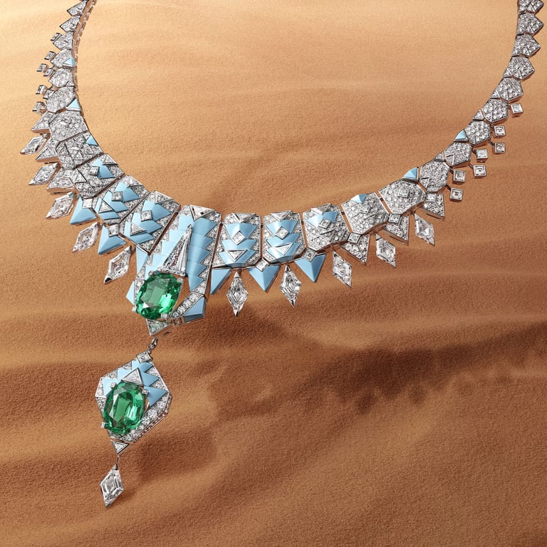 Cartier high jewelry necklace with emerald and diamond accents.