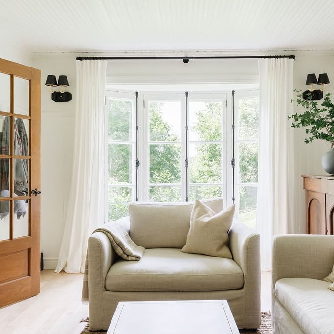 a living room with a couch and a coffee table