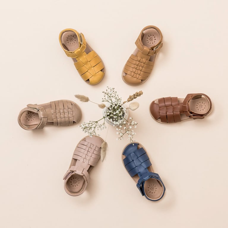 Product photography - a group of baby's shoes
