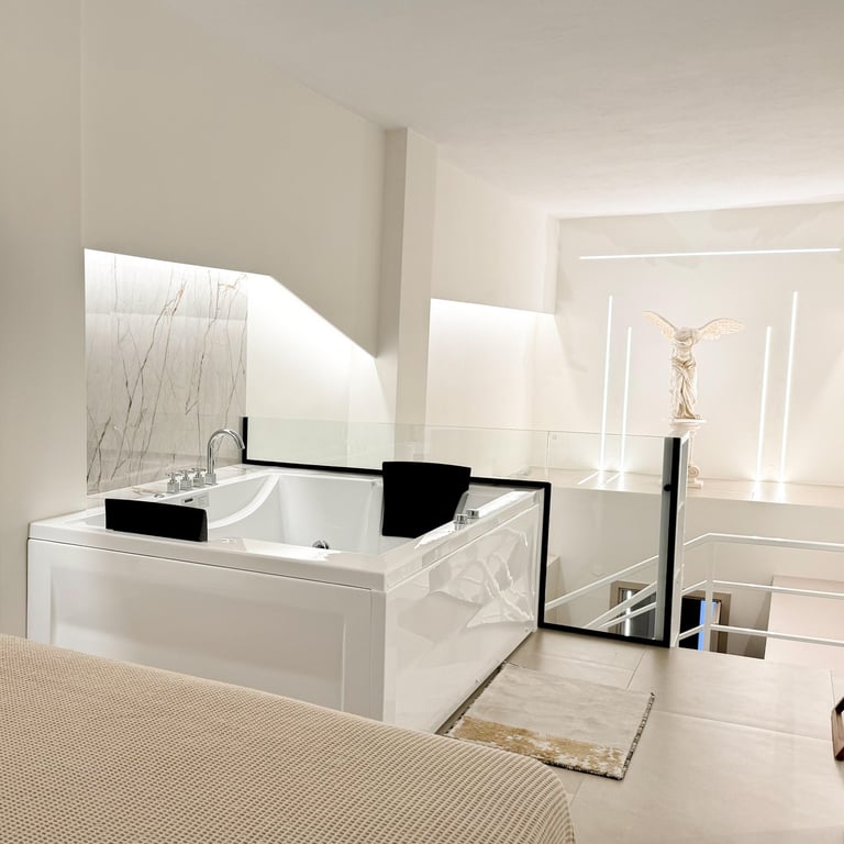 Double seated Jacuzzi with hydro massage feature overlooking the statue of Nike